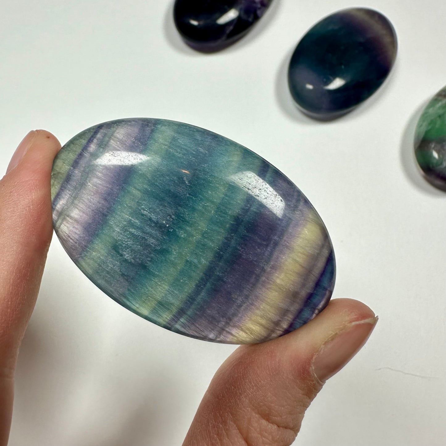 Rainbow fluorite palm stone (B)