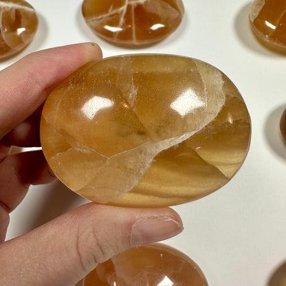 Honey Calcite Palm Stone (G)