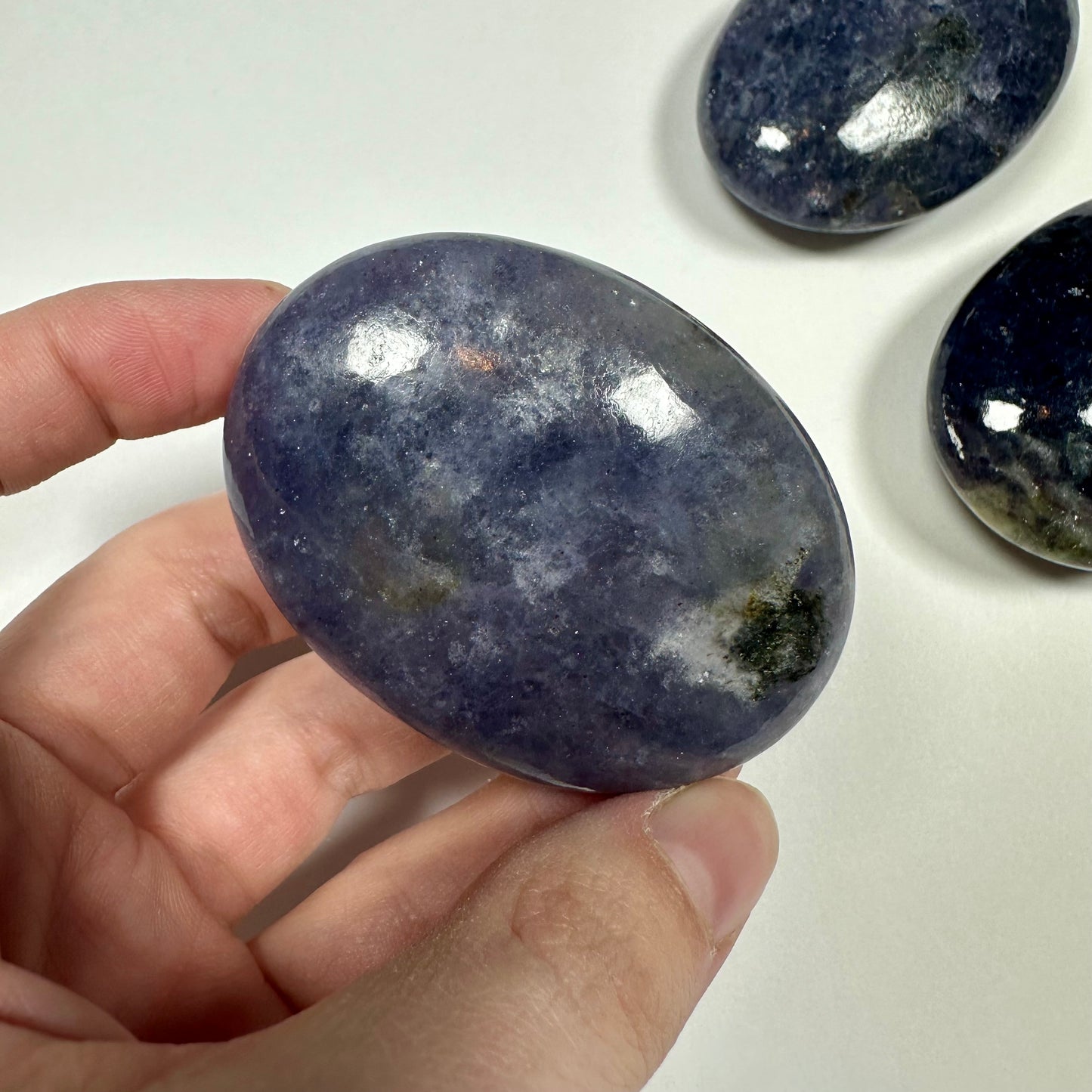 Iolite palm stone (A)
