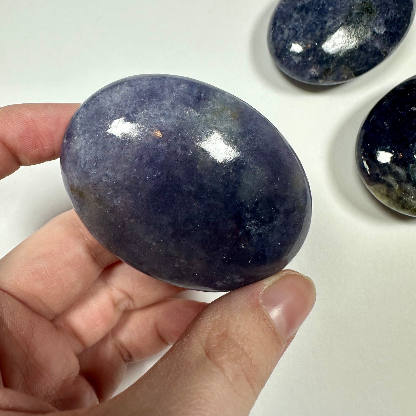 Iolite palm stone (A)