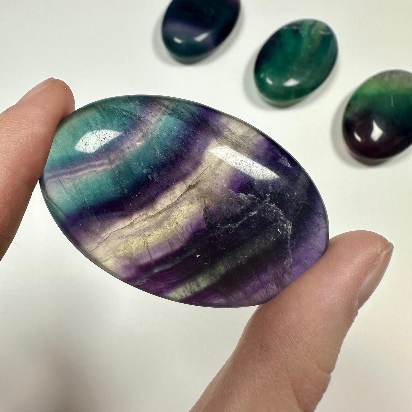 Rainbow fluorite palm stone (F)