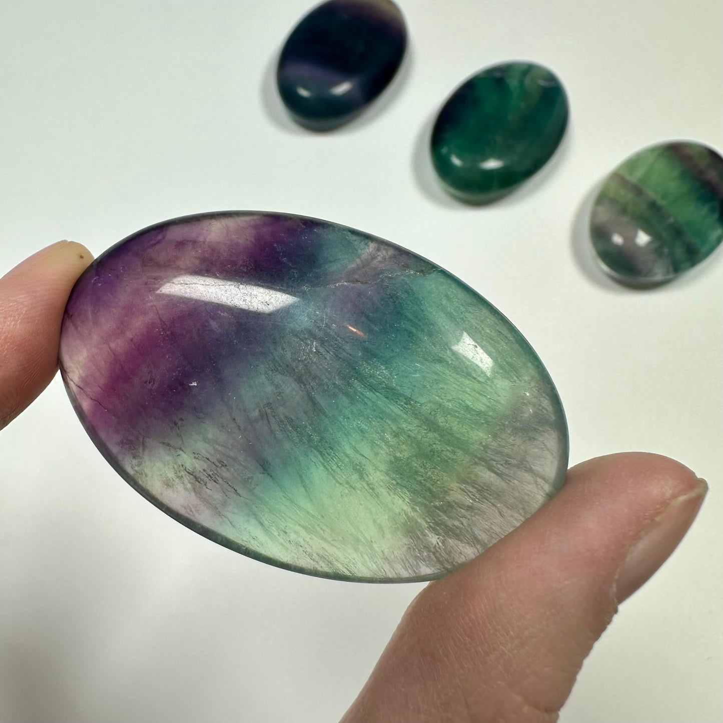 Rainbow fluorite palm stone (G)