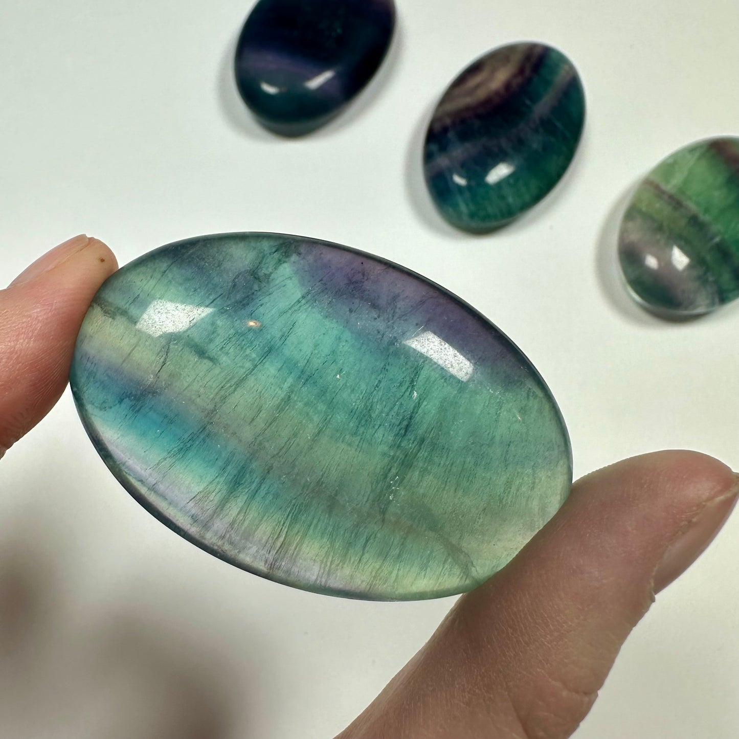 Rainbow fluorite palm stone (H)