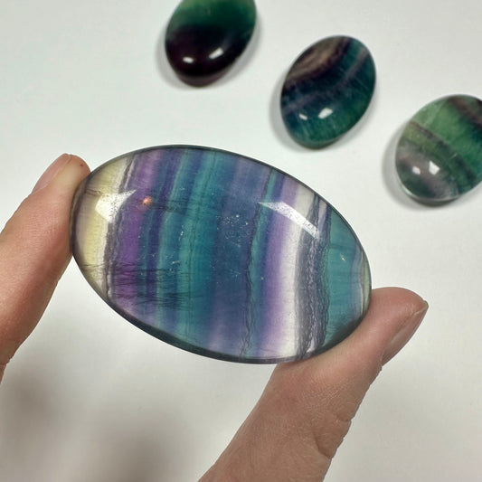 Rainbow fluorite palm stone (I)